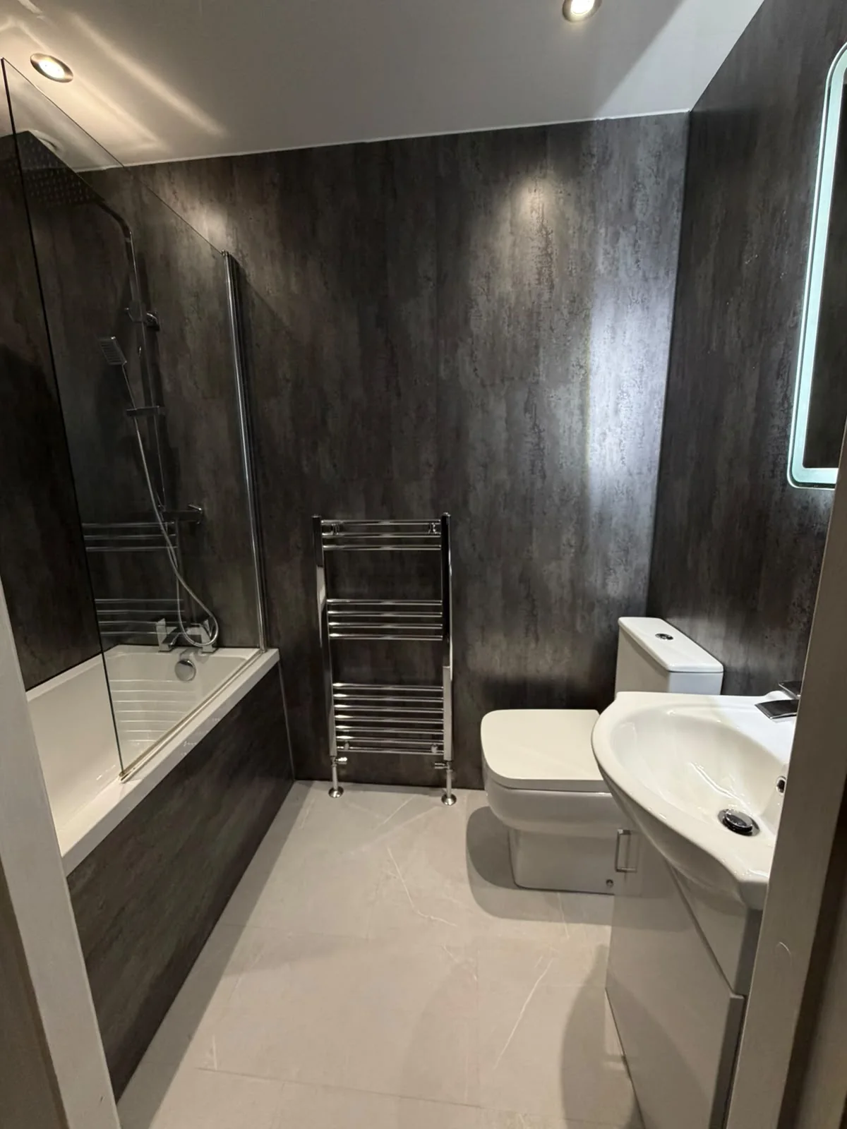 Contemporary bathroom installation by A.T. Plumbing & Heating