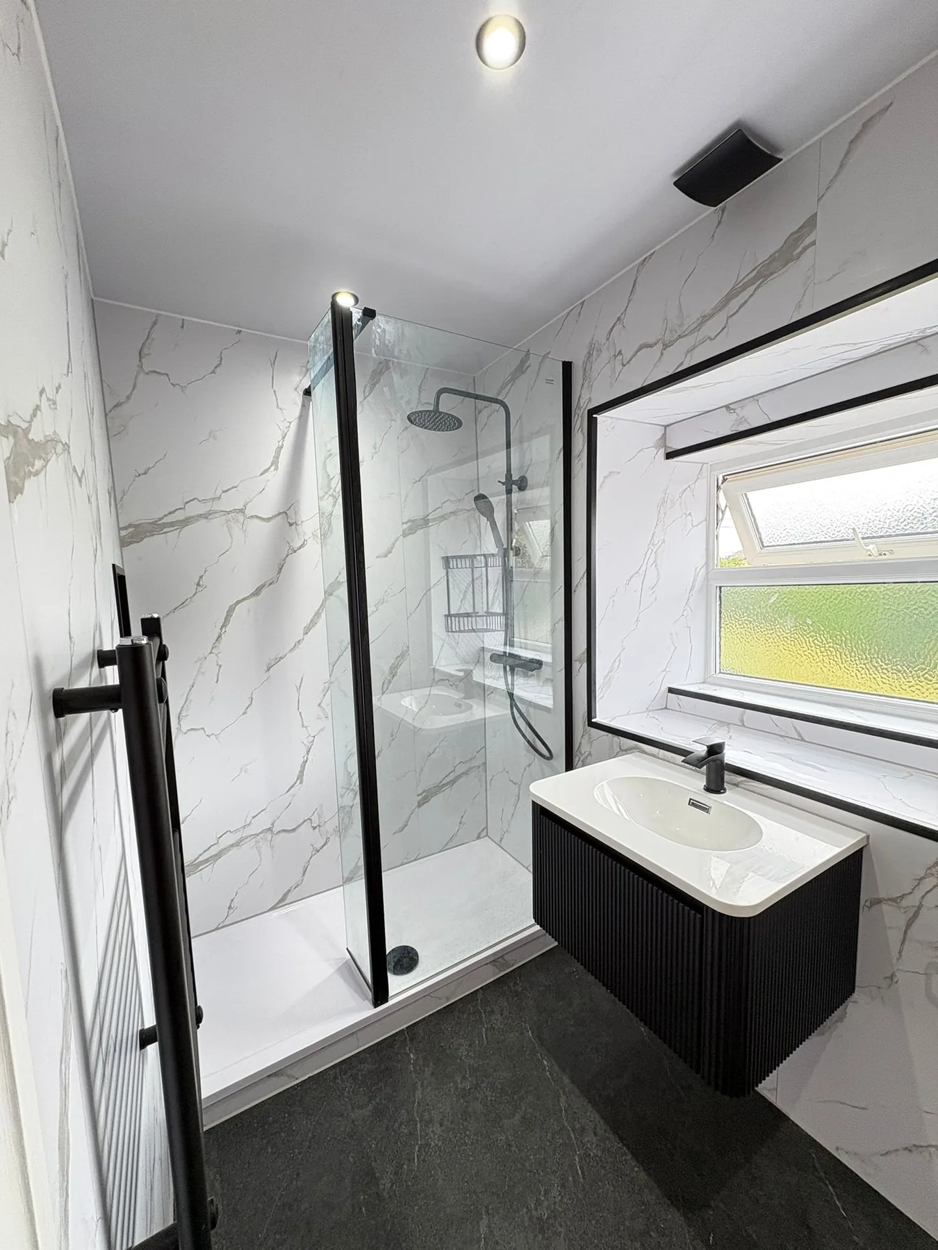 Modern bathroom installation by A.T. Plumbing & Heating